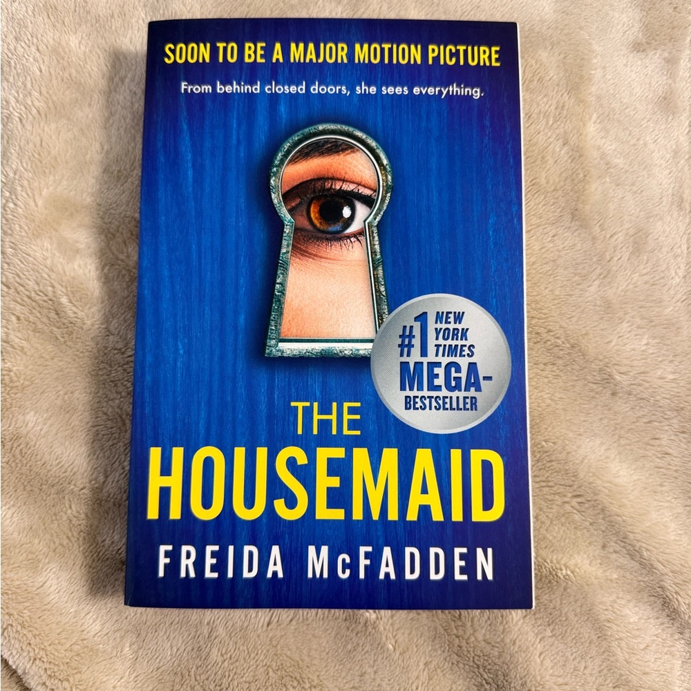 The Housemaid by Freida McFadden - Bold Blue & Yellow Paperback